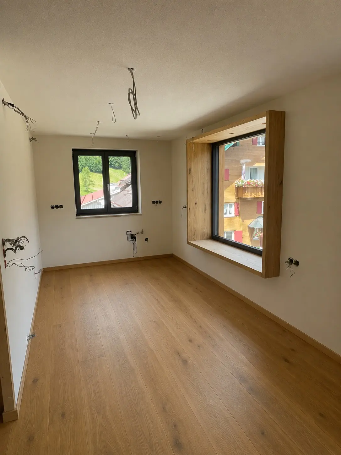 Wohnung unten, Wohn-Ess-Bereich mit Panoramafenster